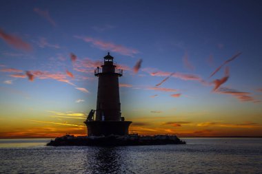 Gündoğumunda West Bank deniz feneri, Hudson Körfezi, New York, ABD
