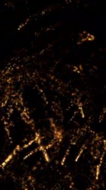 dikey animasyon - Işıldayan altın parçacıkları lüks veya şenlikli bir arka plan konsepti için girdap.