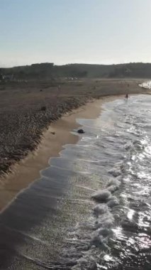 Aerial Summer Holiday, sea sand sun themed summer vacation image, yellow beach with waves, immaculate holiday relaxation beach