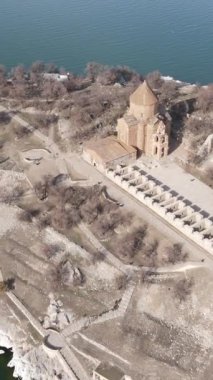 Aerial drone view of Akdamar church, the ruins of the ancient church and its architecture on the island, the historical Armenian church built on the island in Lake Van
