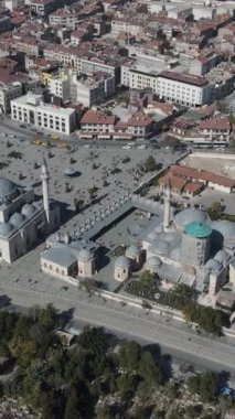 Drone view of the famous Sultan Selim Mosque and Mevlana Tomb of Konya, the settlement of touristic places from the air, the historical beauties architecture of Konya shoot by drone