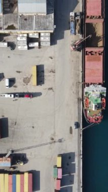 Famagusta port drone view, cargo ships waiting at the port, containers used for maritime trade, large cargo ships anchored in the port