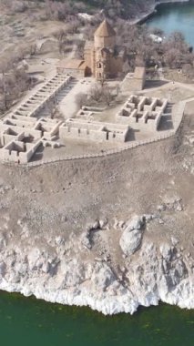 Aerial drone view of Akdamar church, the ruins of the ancient church and its architecture on the island, the historical Armenian church built on the island in Lake Van