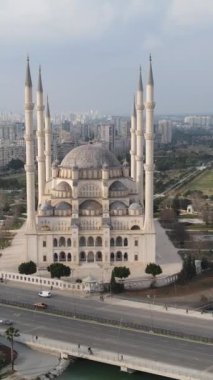 View of Sabanci Mosque, the largest mosque of the island, drone view of the mosque built by the river, Islamic place of worship, magnificent mosques