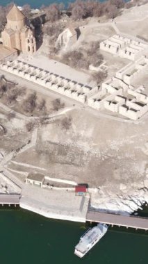 Aerial drone view of Akdamar church, the ruins of the ancient church and its architecture on the island, the historical Armenian church built on the island in Lake Van