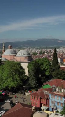 Aerial Of Bursa Green Tomb, bursa green complex and surrounding settlement drone view, drone view of historical places in bursa