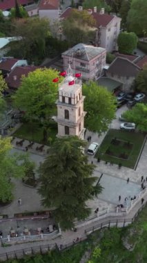 Aerial bursa tophane clock tower, drone view of historical buildings, touristic clock tower of the city in bursa