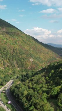 Aerial drone view of the green mountain on which the city of Travnik rests, the view of the mountain on which the city is built, the natural vegetation of bosnia clipart