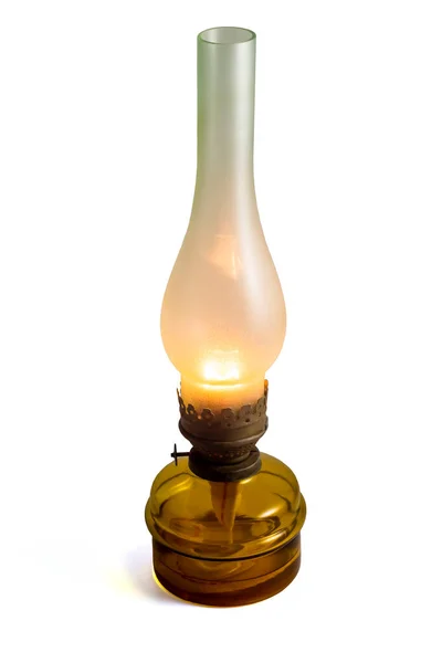 Old kerosene lamp on a white background.