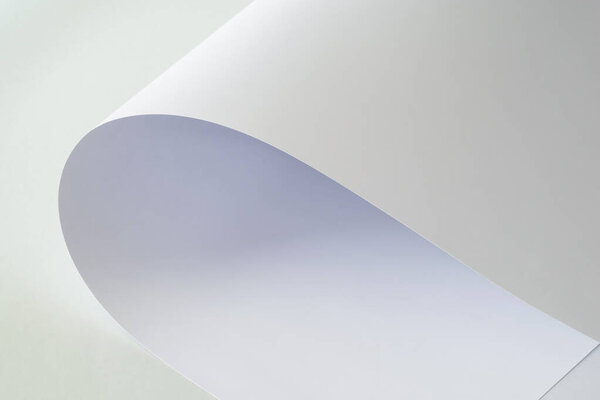 A large sheet of white paper on a light background.