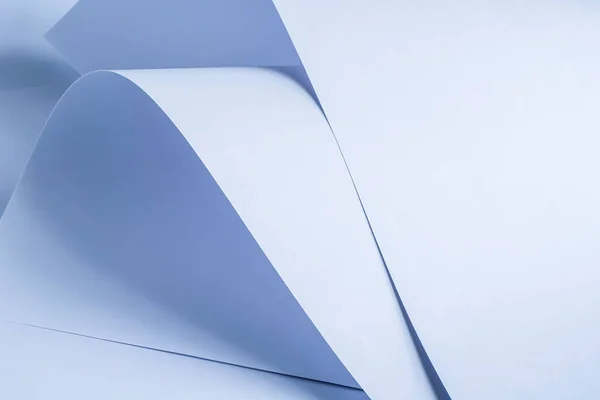stock image Large sheets of white paper in cold colors.