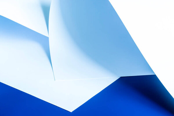 Two large sheets of paper. The image is blue.