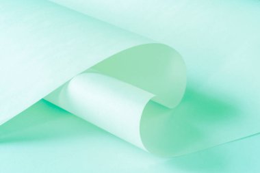 Arka plan olarak bir rulo soğuk pastel rengin kağıtları.