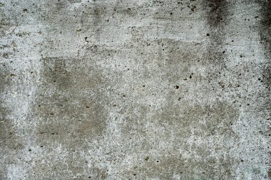 Arkaplan olarak eski gri beton duvar.