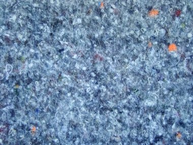 Arkaplan gibi hissedilen yapay tekstil materyali.