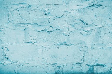 Arkaplan olarak tuğlaya rastgele sıva yerleştirilmiş. Güzel ton..