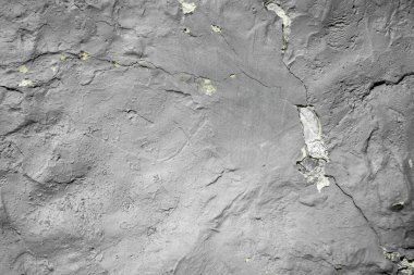 Soyut arkaplan. Arka plan olarak duvar yüzeyinde eski, çatlak, soyulmuş boya ve alçı var..