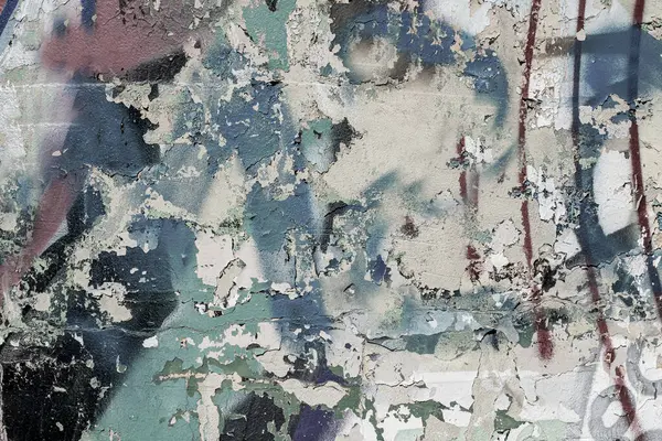 Şehir duvarına yazılan grafitilerin soyutlanması. Renkli soyut arka plan. Eski, çatlak, arka plan olarak duvardaki boyayı soyuyordum. Tarafsız, sakin renklerde soyut bir arka plan..