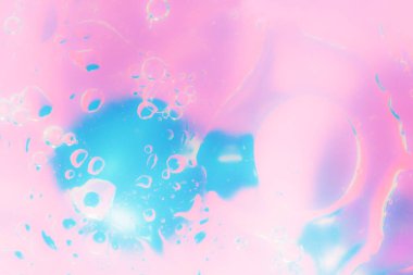  Renkli resimli pastel renklere sahip soyut bir arkaplan. Makro sıvı maddeler. Biyoloji, fizik veya kimya. Uzay, evren. Su kabarcıkları.