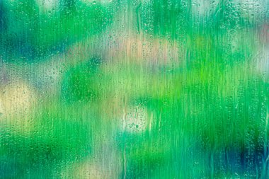 Pencere camında akan su kullanılarak soyut arkaplan.