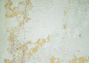 Parçalanmış alçı ve duvardaki boya soyut bir arkaplan gibi..