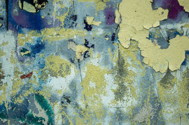Soyut: Şehir duvarına dökülen graffiti. Renkli soyut arka plan. Eski, çatlak, soyulmuş boya arka plan görevi görüyor..