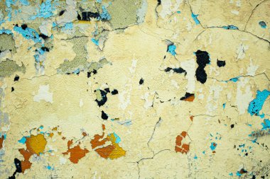 Soyut: Şehir duvarına dökülen graffiti. Renkli soyut arka plan. Eski, çatlak, soyulmuş boya arka plan görevi görüyor..