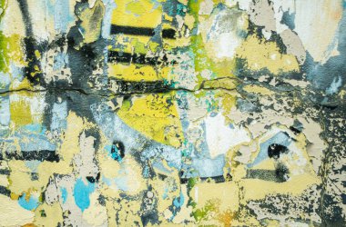 Soyut: Şehir duvarına dökülen graffiti. Renkli soyut arka plan. Eski, çatlak, soyulmuş boya arka plan görevi görüyor..