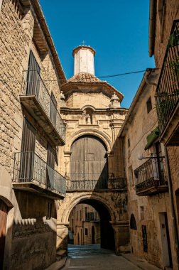 Entrance door to the medieval town of Calaceite in the Matarraa region. Teruel Spain. clipart