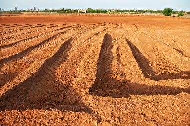 Freshly plowed. Preparing the ground for new beginnings in the Spanish garden. clipart