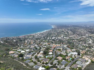 Aerial view over La Jolla Hills with big villas and ocean in the background, San Diego, California, USA