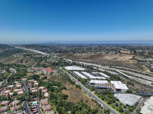 Aerial view of small city Poway in suburb of San Diego County, California, United States. Houses next the valley during dry season