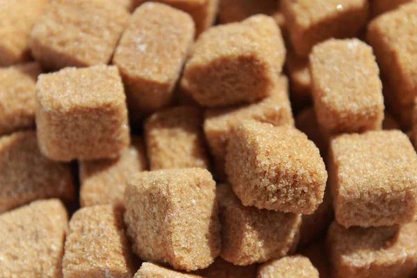 Brown sugar cubes. Demerara golden brown sugar
