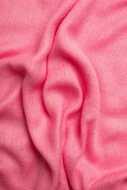 Pink soft fabric shaped as female genital organs, vulva and labia, vagina concept. High quality photo