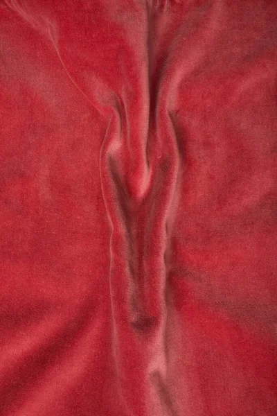Pink soft fabric shaped as female genital organs, vulva and labia, vagina concept. High quality photo