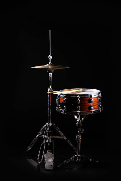 Drum Set On A Stage At Dark Background. Musical Drums Kit On Stage. Vintage look with smoke effect. High quality photo