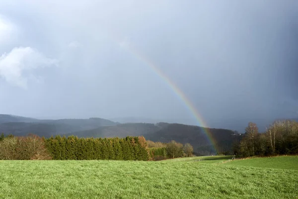 photographed a colorful rainbow in spring in april in germany