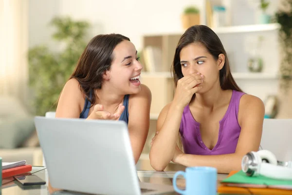 Woman with bad breath talking to friend at home