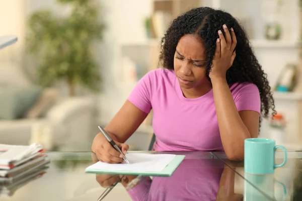 Black Sad Woman Signing Form Complaining Home Stock Photo