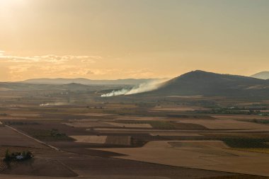 the Spanish mesas near Consuegra in the La Mancha region of Spain at sunset