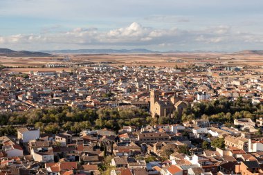 panoramic view over the orange tile roofs to a small spanish town village Consuegra