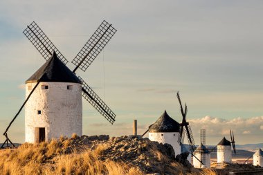 windmill on a mountain at sunset of Consuegra, Toledo province, Castilla la Mancha, Spain