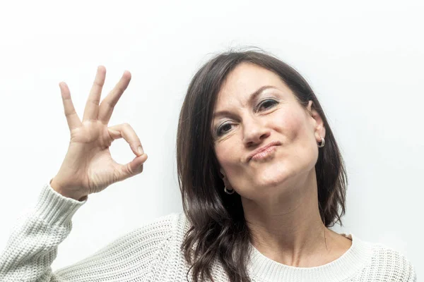 Stock image Success and Approval: Female Hand Making Gesture of Approval on White Background