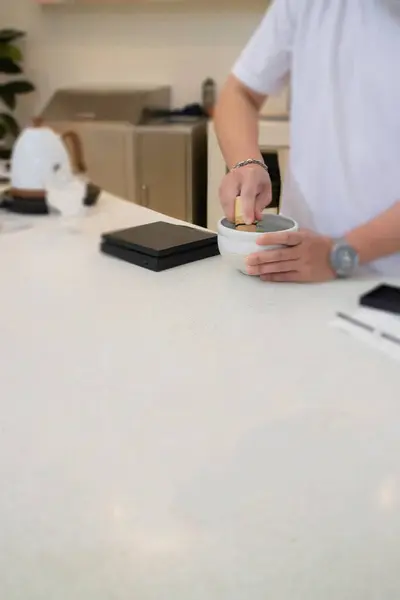 stock image Man hand brews matcha tea, stock photo