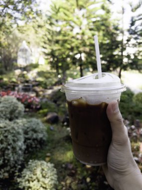 Iced drink in plastic container, stock photo