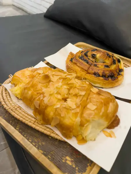French breakfast with pastries at work from home, stock photo