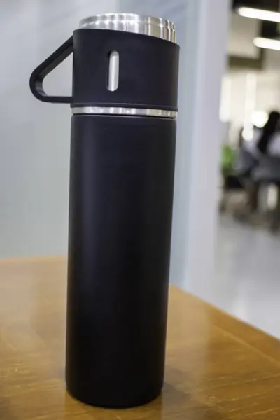 stock image Thermos for preservation of a hot or cold drink water bottle, stock photo