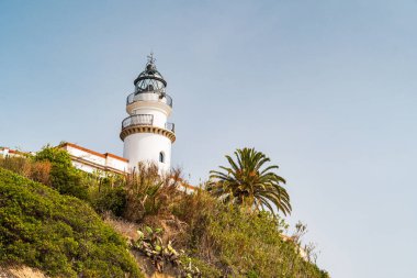 Far de Calella - Calella 'daki antik deniz feneri. Costa del Maresme, İspanya, Katalonya