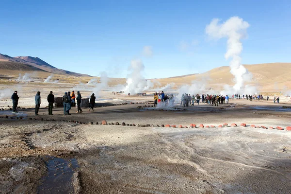 stock image El Tatio, Chile - August 16, 2019: tourists visiting geyser El Tatio in Chile