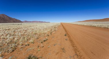 Namibya 'daki muhteşem çöl manzarasının fotoğrafı.